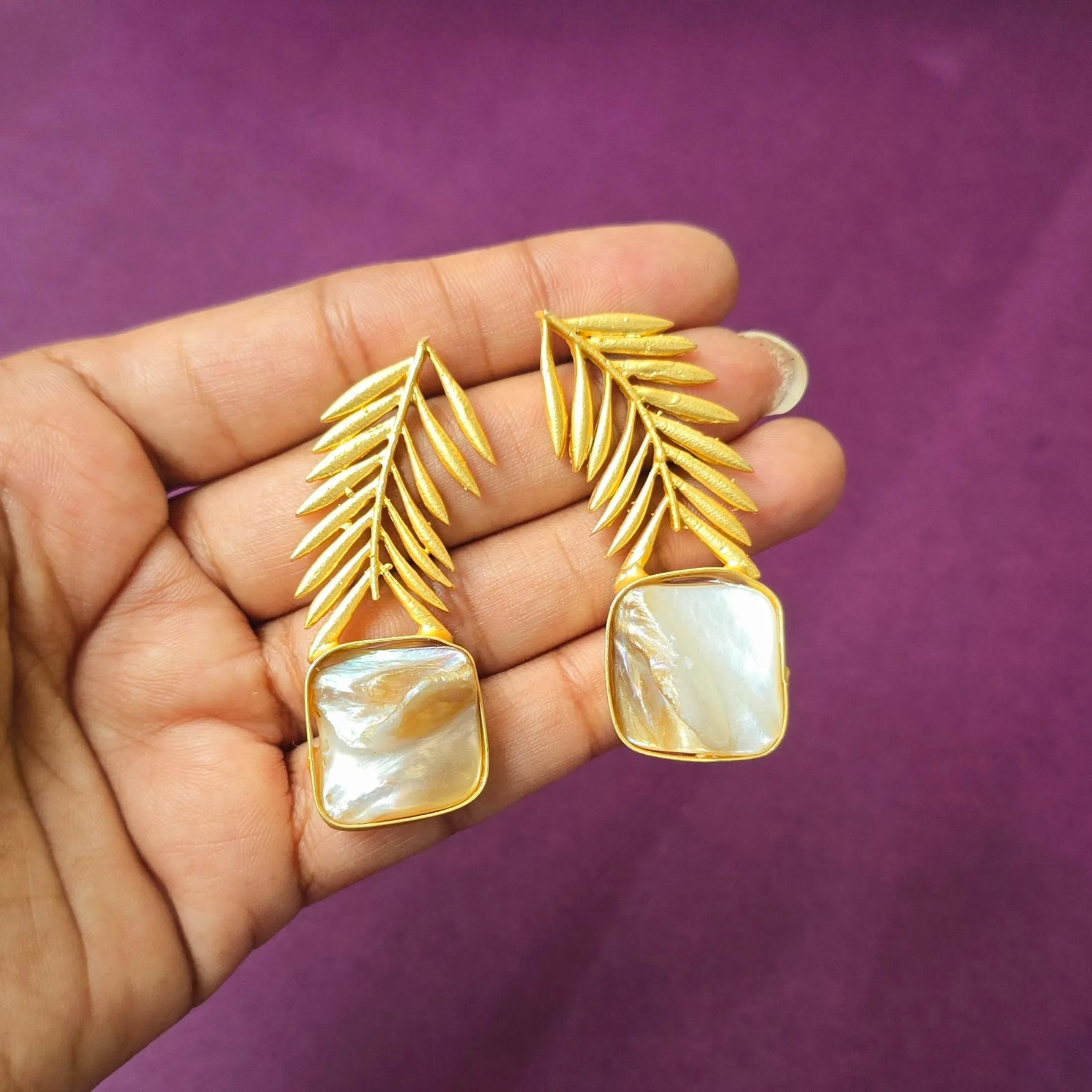 Golden leaf modern earrings